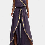 Lorena - Mono Elegante con Detalles Dorados