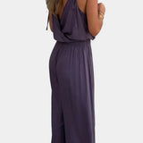 Lorena - Mono Elegante con Detalles Dorados