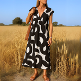 Magdalena - Vestido fluido con escote en V