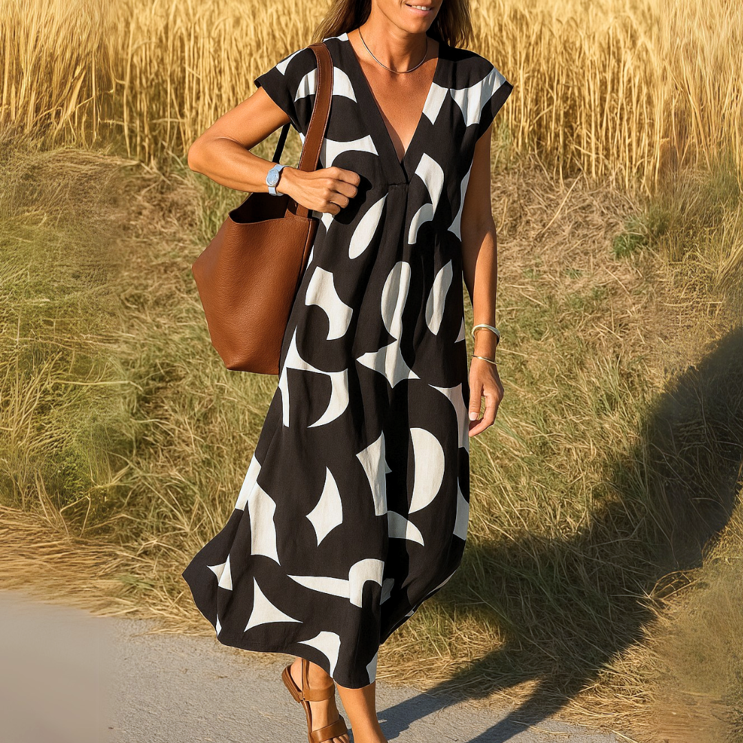 Magdalena - Vestido fluido con escote en V