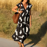 Magdalena - Vestido fluido con escote en V
