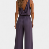 Lorena - Mono Elegante con Detalles Dorados