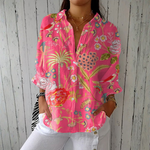 Joana - Blusa Tropical con Estampado Floral