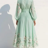 Elga - Vestido maxi plisado en chiffon con estampado floral