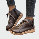Botas ortopédicas de cuero de caña baja para la mujer moderna.