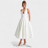 Efi - Vestido midi texturizado con elegancia moderna