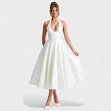 Efi - Vestido midi texturizado con elegancia moderna