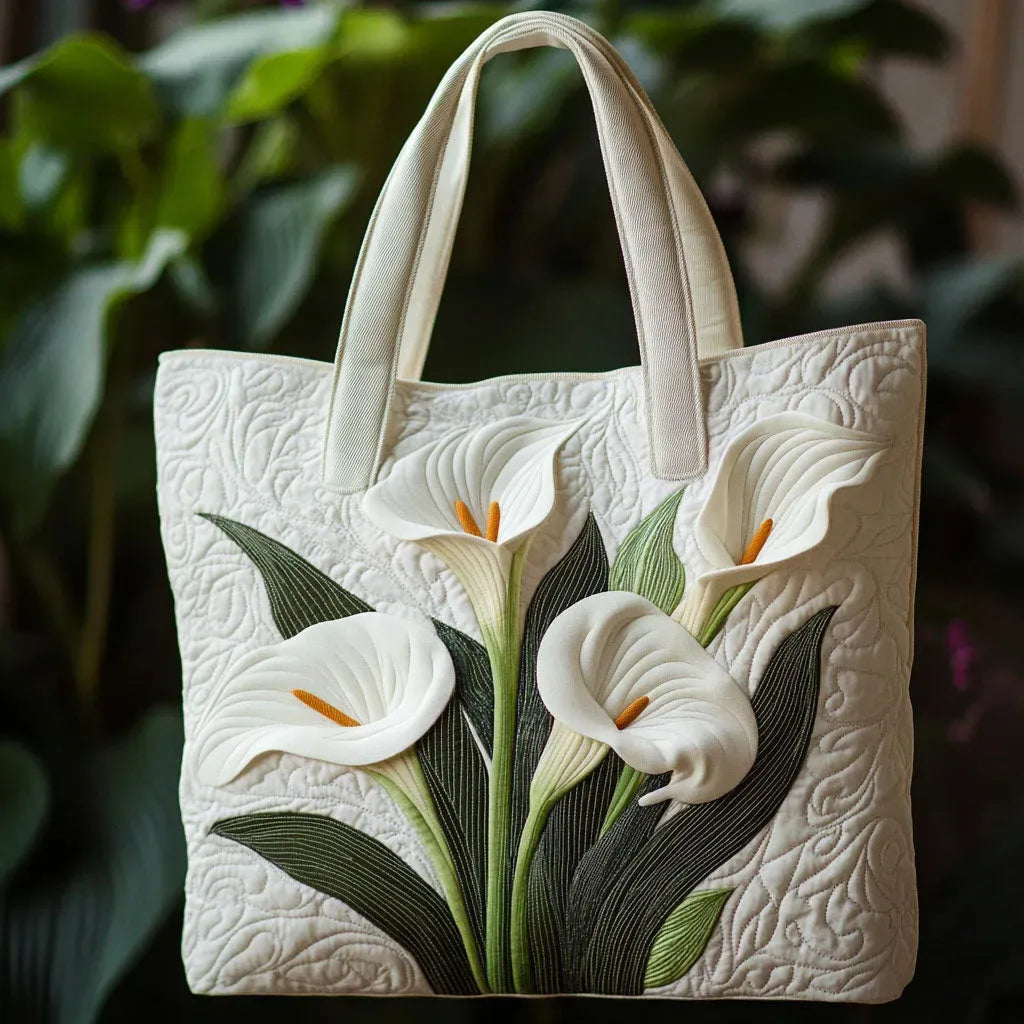 Bolso tote acolchado blanco con calas blancas y hojas verdes en relieve